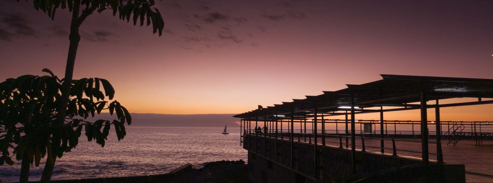 Where sunsets chill the sea